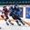 KAMLOOPS, BC - APRIL 1: Finland's Petra Nieminen #11 and Czech Republic's Petra Herzigova #6 battle for the puck during quarterfinal round action at the 2016 IIHF Ice Hockey Women's World Championship. (Photo by Matt Zambonin/HHOF-IIHF Images)

